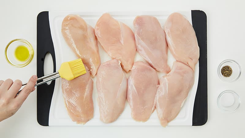 brush chicken breasts with olive oil