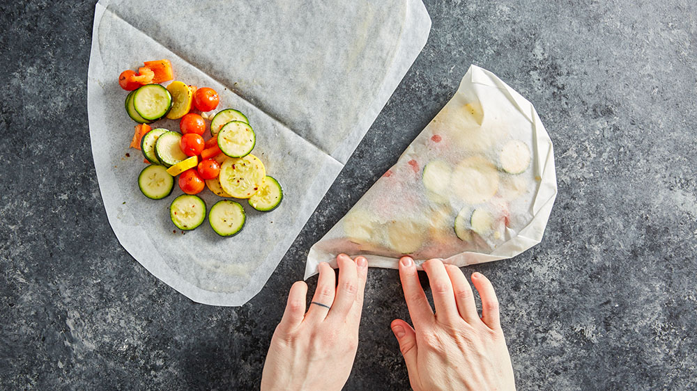 folding food into parchment using heart method