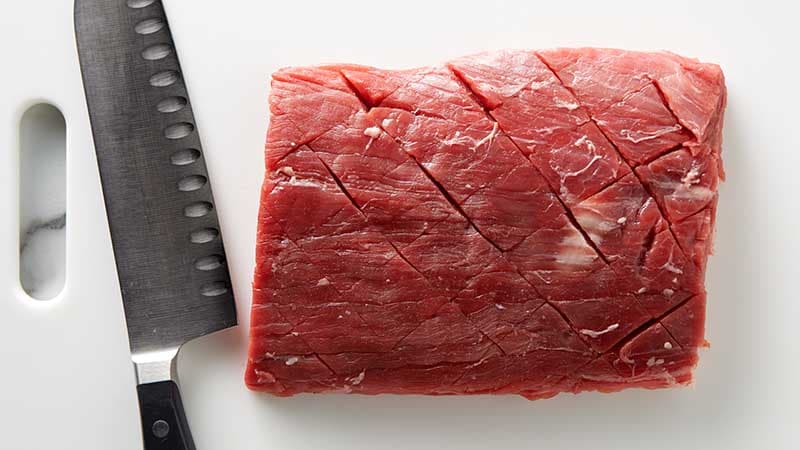 cut steak in diamond pattern