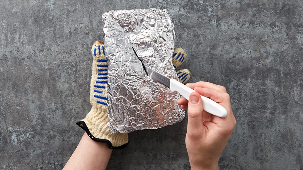 cutting open foil pack