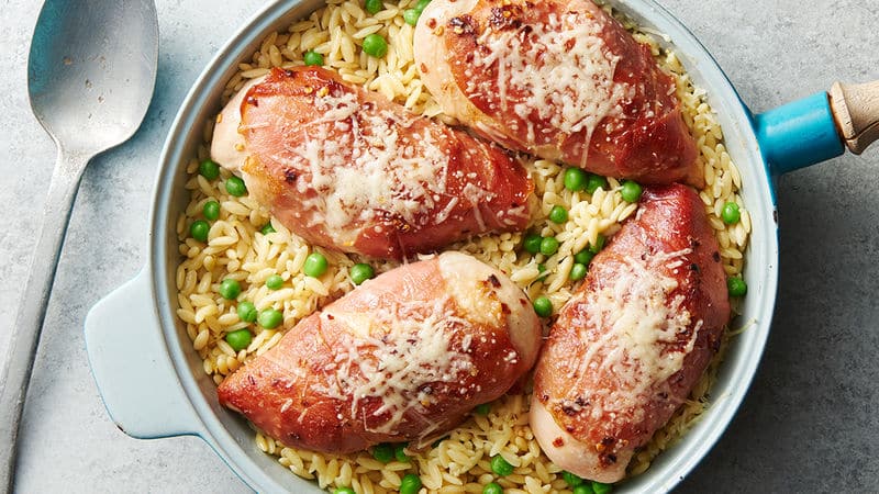 prosciutto-wrapped chicken with lemon orzo and peas